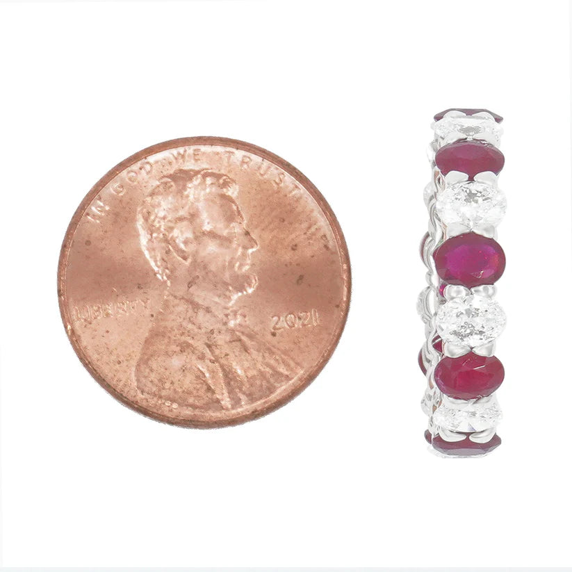 14K White Gold Oval Cut Diamond & Ruby Eternity Ring Size comparison to a coin