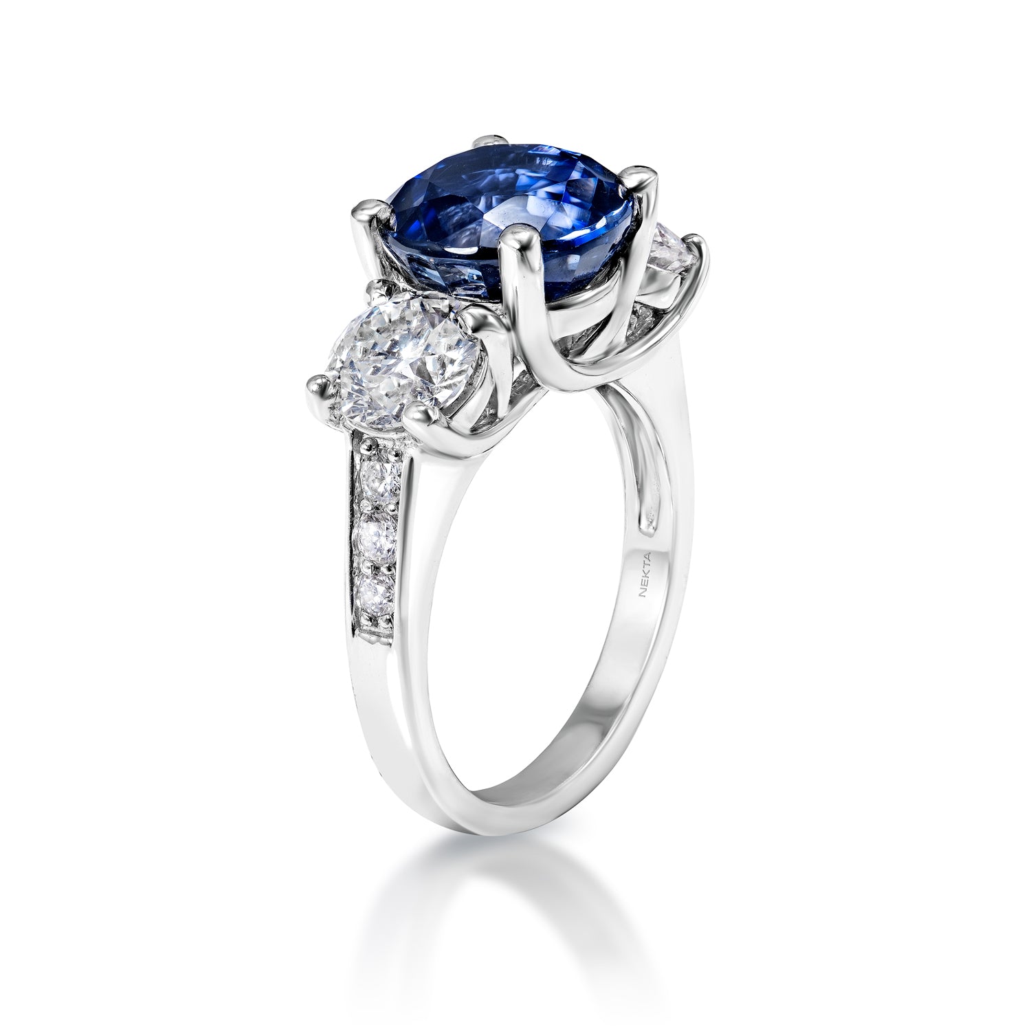 8 Carat Round Brilliant Blue J'adore Sapphire Ring Side